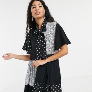 Sister Jane pleated star midi dress with pussybow